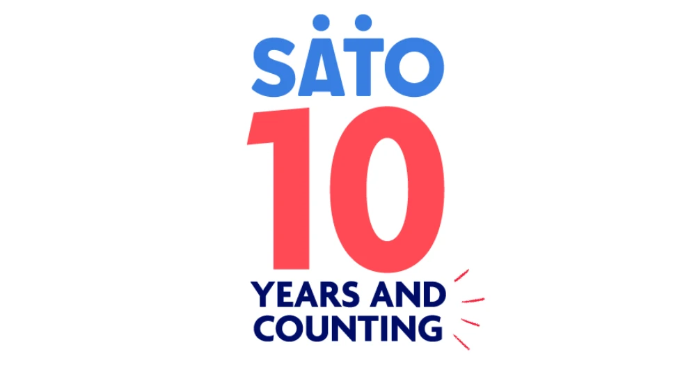 SATO 10 years logo with words 10 years and counting